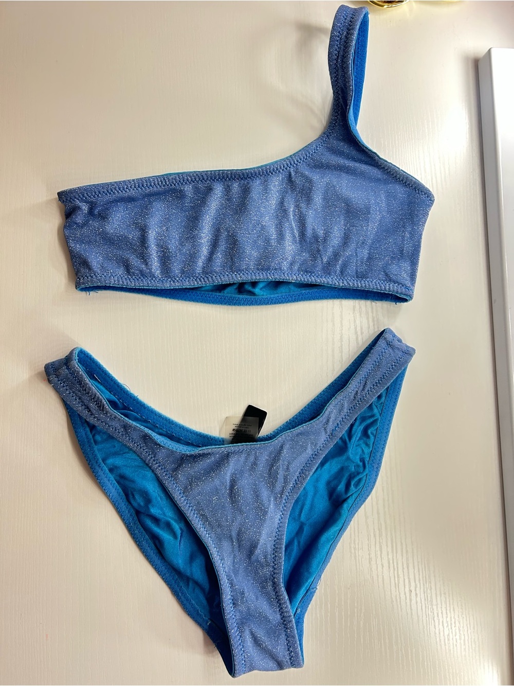 triangl swimwear Shimmery Light Blue One-Shoulder Bikini